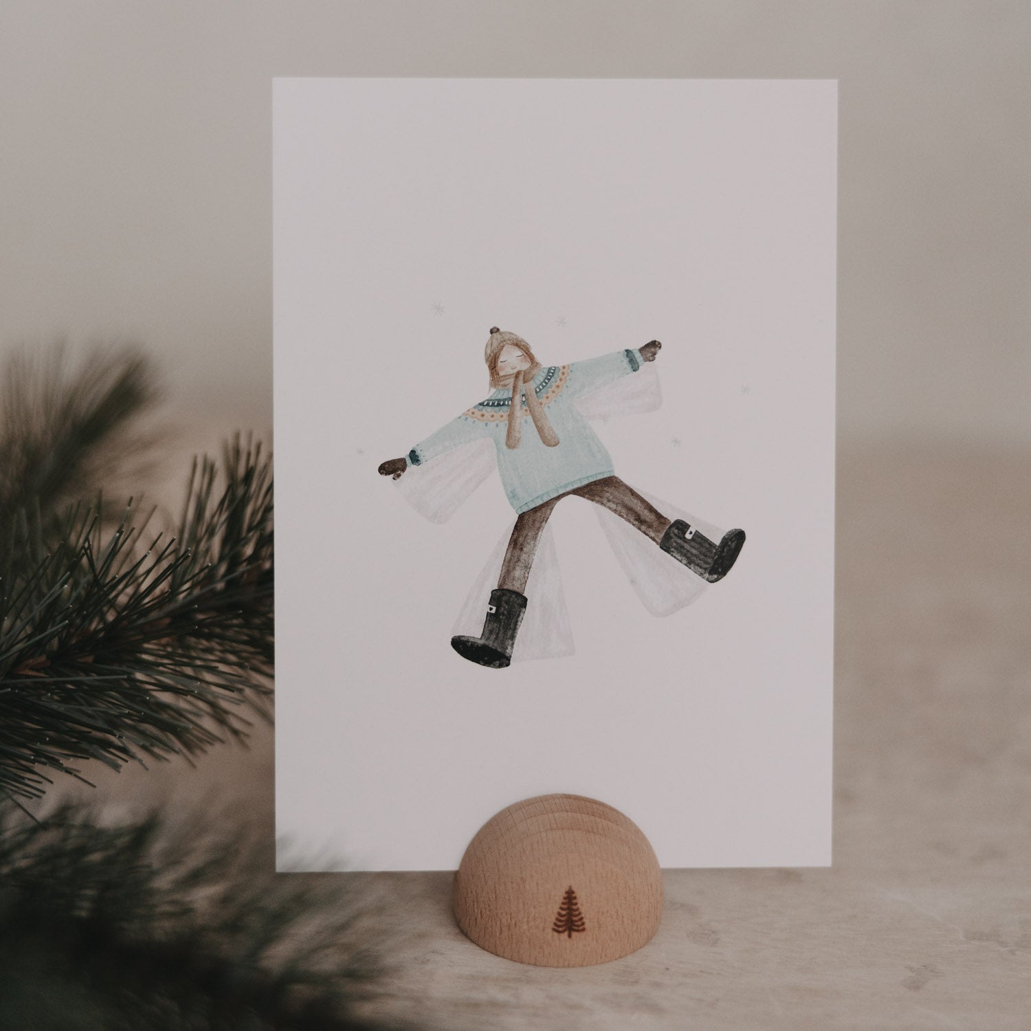 Weihnachtspostkarte Schneeengel